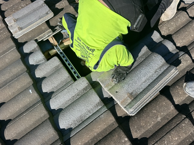 Tile roof restoration — repairs and recoat — before